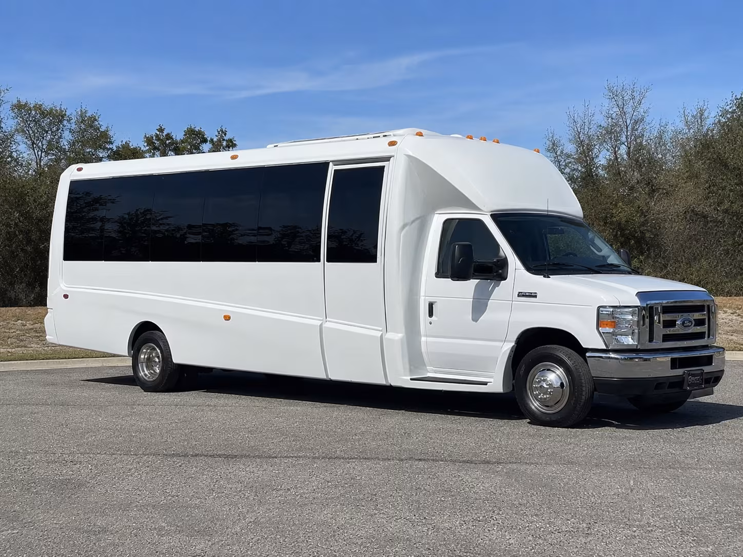 Group beside a Mercedes Sprinter limo in Sunnyvale
